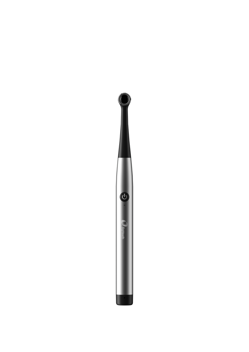 Black and silver curing light on a white background