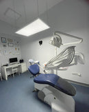 Example of dental office with a hanging shadowless lighting by pro max dental.