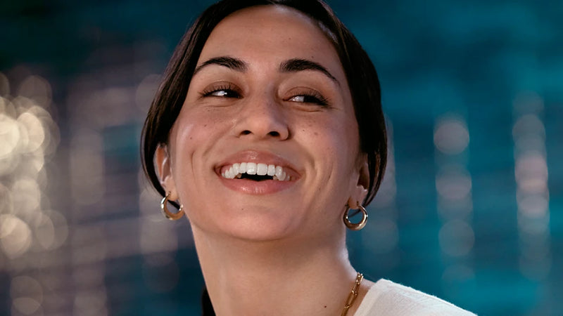 Woman smiling with a blurred background