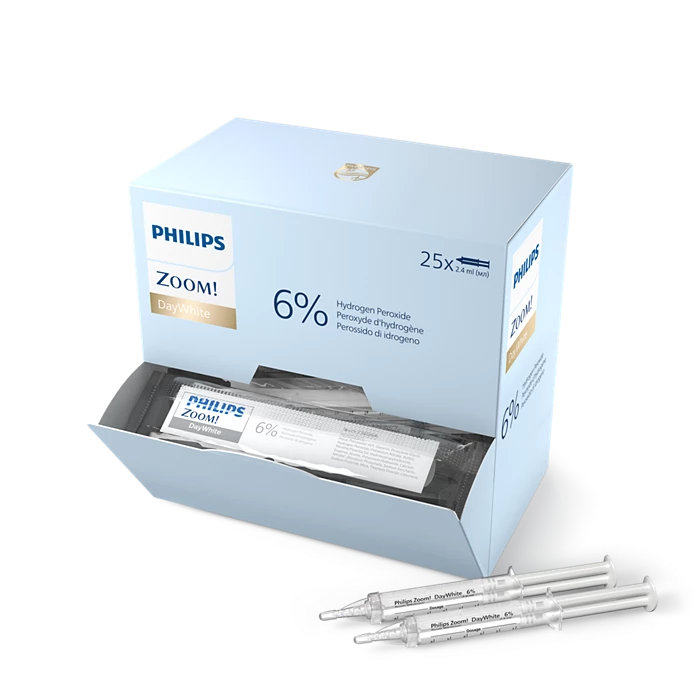 Philips Zoom dental product packaging with syringes on a white background