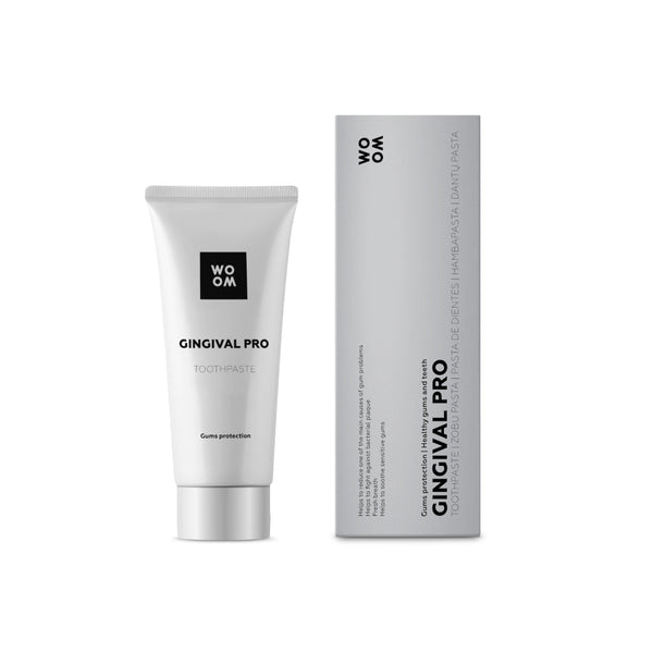 A tube of WOOM GINGIVAL PRO toothpaste next to its packaging box.