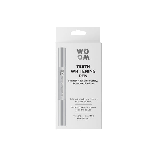 A teeth whitening pen by WOOM in its packaging, with information about the product visible on the front.