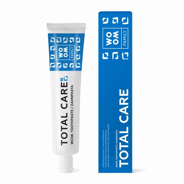 A tube of toothpaste with packaging indicating 'TOTAL CARE' designed for all family members, adults and children.