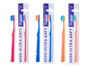Three toothbrushes with ultra soft bristles in red, blue, and orange colors, each packaged in individual cardboard slots with product information.