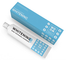 Packaging of WOOM Family Whitening Toothpaste, showing the tube and the box with 'WHITENING' written on them, indicating the product's function.